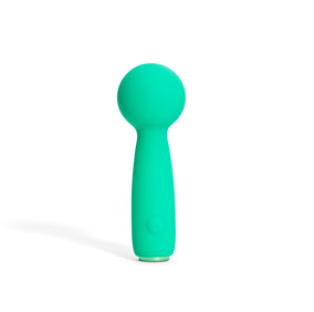 Turquoise handheld massager on a white background