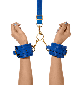 Hands modeling the Orion handcuffs