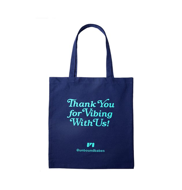 blue unbound tote bag that says Thank you for vibing with us