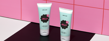 a hand holding Unbound Jelly water based lubricant