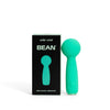Turquoise mini wand vibrator with packaging labeled 'unbÜlÜk' on a white background