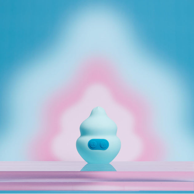 blue squish vibe in front of pink and blue gradient background