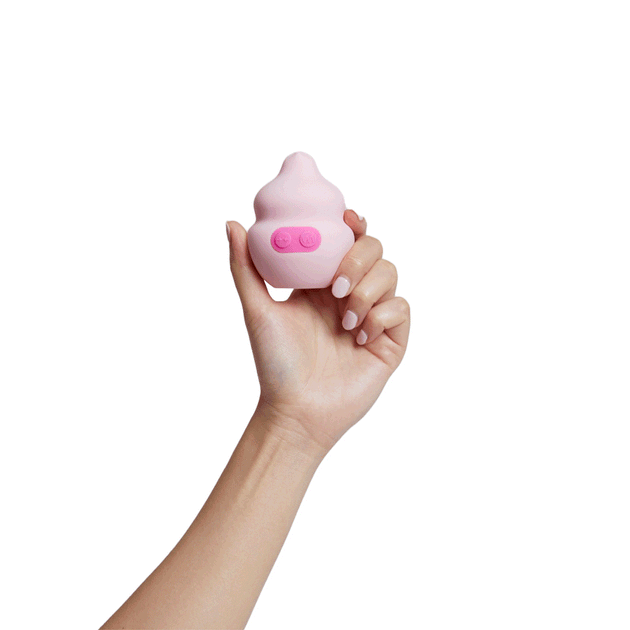 hand squeezing pink squish vibrator