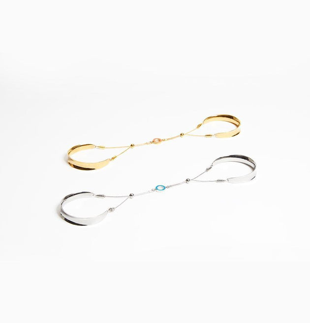 Gold and silver bangle products side by side on a white background