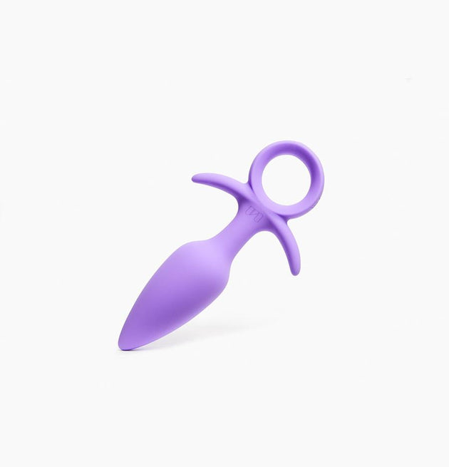 Violet vibrating silicone butt plug