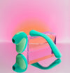 photo of mint bender and mint puff on an orange and pink gradient background