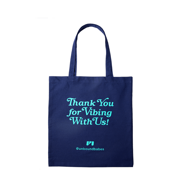 blue unbound tote bag that says Thank you for vibing with us